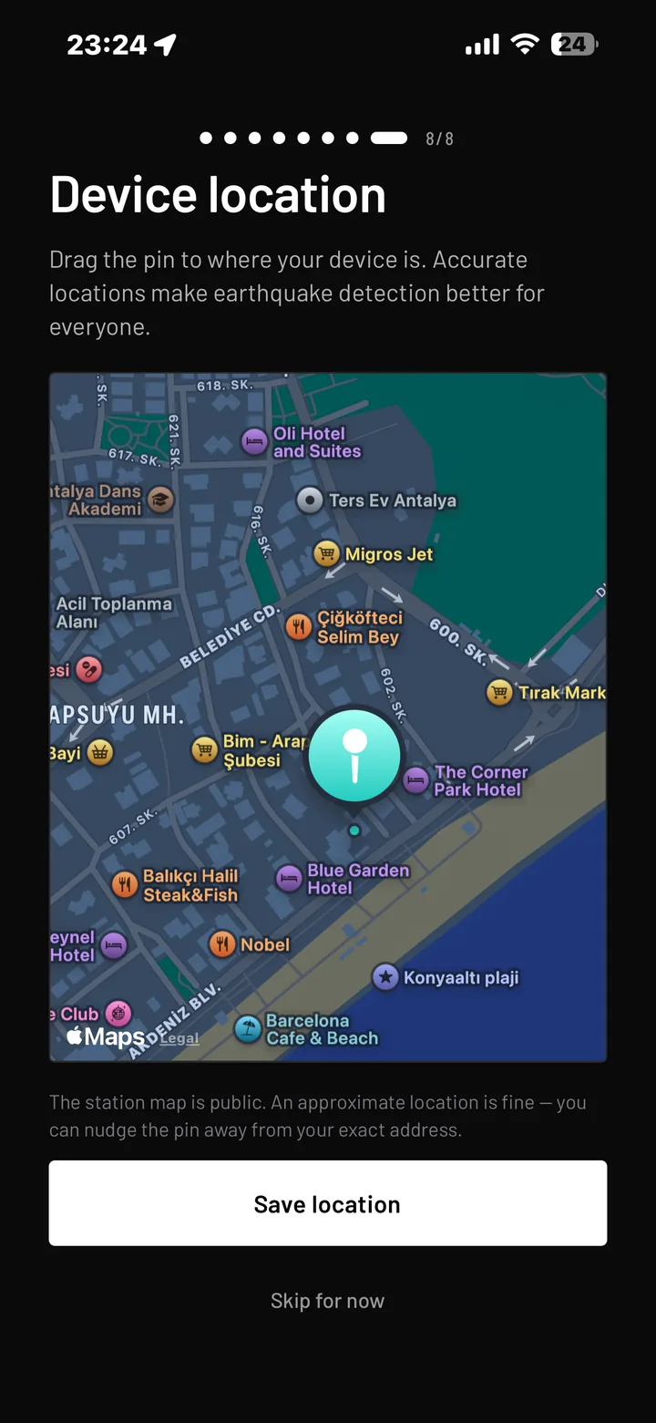 The Device location screen in the app, with a map and a draggable pin